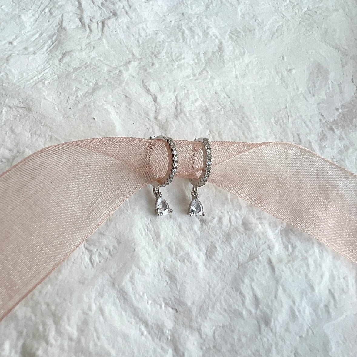 Sterling Silver Mini Iced Huggie Diamond Earrings - Luxora London